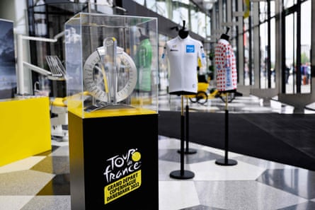The Grand Depart Trophy of the Tour de France cycling race and different jerseys are on display at an exhibition inside the Danish Industry Building in Copenhagen, Denmark