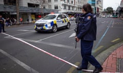 A road near the site of a gun incident is cordoned off in Auckland, New Zealand