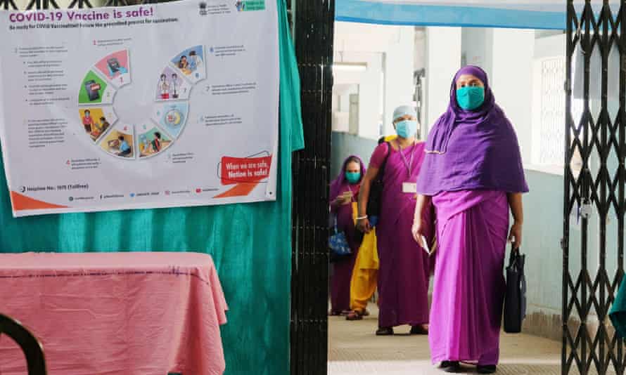 Health workers wait to get vaccinated at Madhyamgram hospital in Kolkata