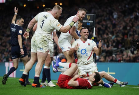 Ben Earl celebrates after scoring England’s third try against Wales