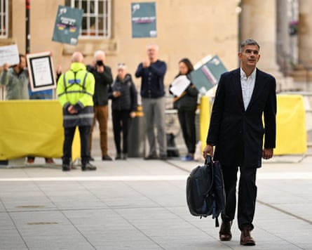 BBC journalists protesting with picket signs