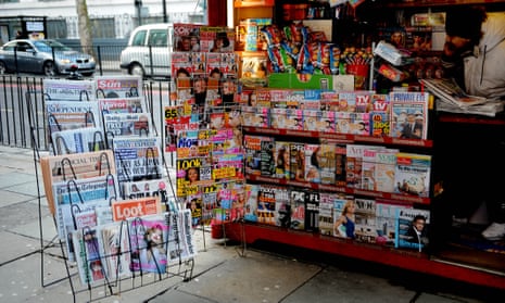 Newspapers and magazines for sale at a London newsstand