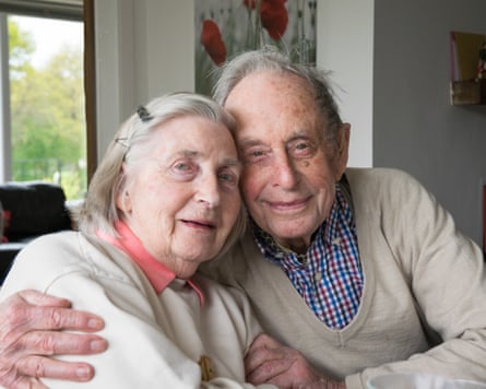 Eva and Eric hug each other as they pose for a photo