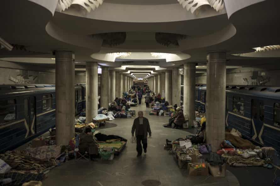 People in a metro station being used as a bomb shelter in Kharkiv on Saturday.