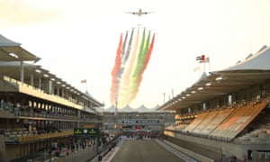 A flypast over the grid of the Yas Marina Circuit before the race