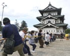 Japan enlists 1,800 people to drag a 360-tonne castle keep using ropes and rollers
