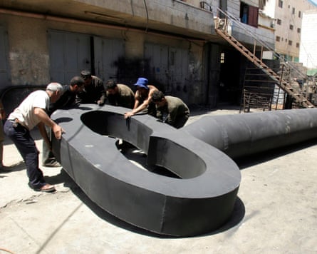 Palestinians manufacture a giant symbolic key to mark the 60th anniversary of the Palestinian Nakba (Day of Catastrophe), in the Aida refugee camp near Bethlehem, May 2008.