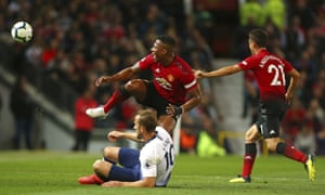 Harry Kane takes out Antonio Valencia.