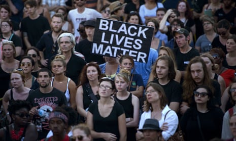 People gather at the Confederate Museum during a protest in Charleston, South Carolina on 20 June 2015. 