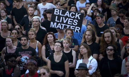 People gather at the Confederate Museum during a protest in Charleston, South Carolina on 20 June.