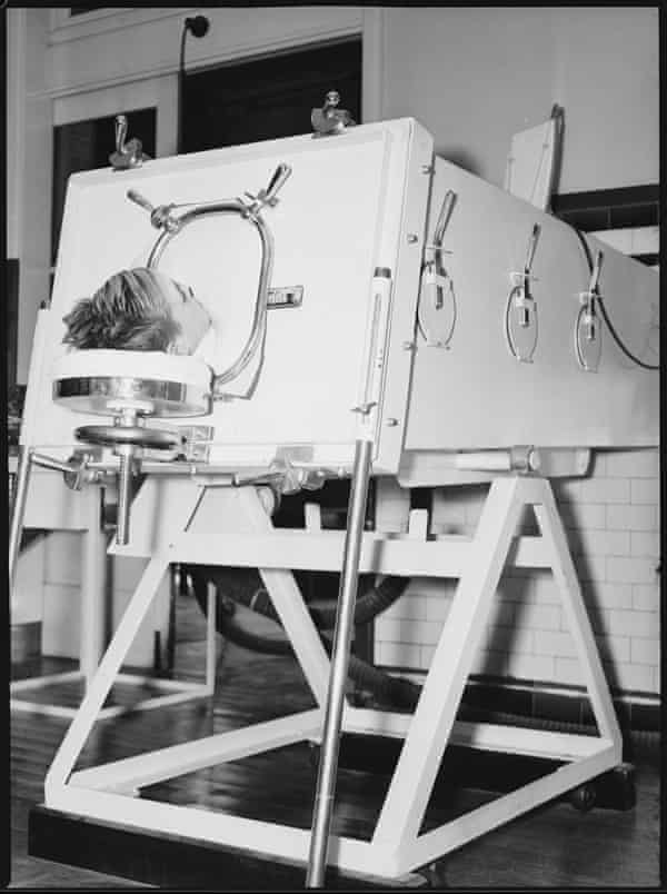 A child lies in an iron lung at the Children’s Hospital 20 May 1938.