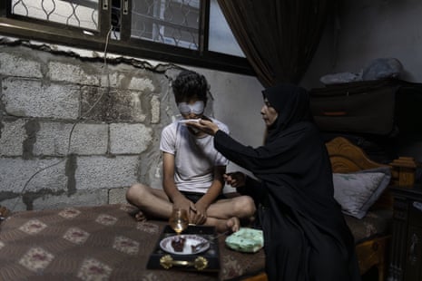 15-year-old Taha Bassem Mekadmeh, who fled from northern Gaza to the Bureij Refugee Camp in the central Gaza Strip, lost his sight and now continues his struggle for life as the fourth disabled member of his family following the shooting in the head by Israeli soldiers while waiting for humanitarian aid in the Netzarim area, in Deir al-Balah, Gaza on August 8, 2025.