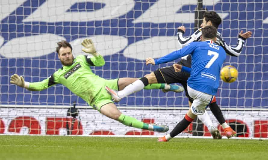 Hagi beats Alnwick to score the third.