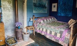 The wagon has a double bed and beautiful paintings