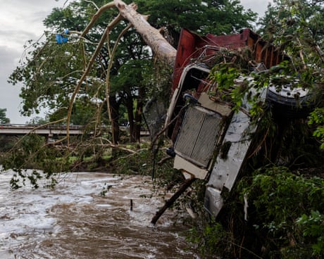 Texas floods: search continues with dozens dead or missing