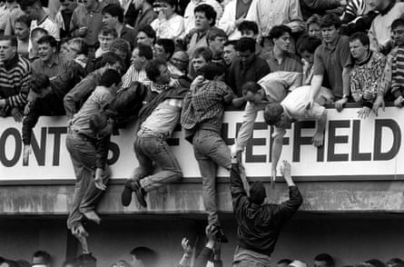 Football fans desperately try to escape the crush at Hillsborough, 4 April 1989.