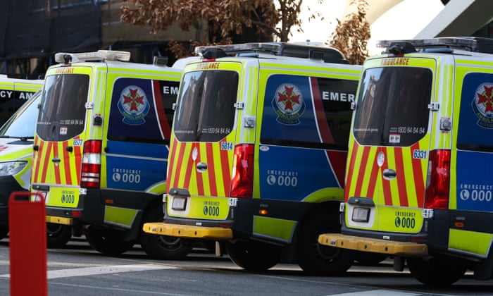 Ambulances are parked in front of the Royal Melbourne hospital on 21 July.