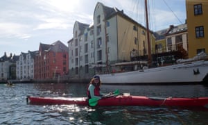Maddy paddling in Ã
lesund harbour, Norway