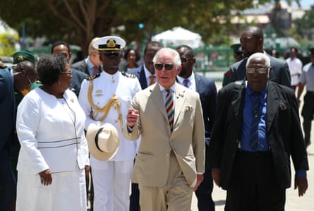 The then Prince of Wales on walkabout with the prime minister of Barbados, Mia Mottley, in Bridgetown, Barbados, during his 2019 tour of the Caribbean.