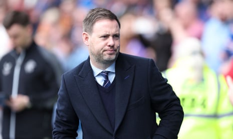 michael beale in v-neck and tie