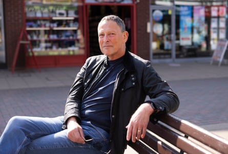 A man sitting on a bench