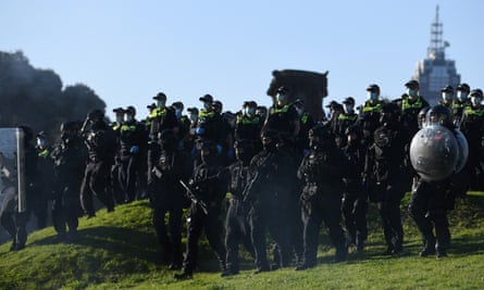 Riot police move protesters on at the Shrine of Remembrance on Wednesday.