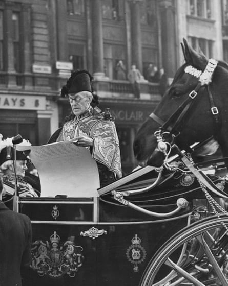 AGB Russell, the Lancaster herald, reading the proclamation of the accession of Queen Elizabeth II from a royal carriage at Charing Cross after the death of her father, King George VI.