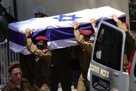 Israeli soldiers carrying a coffin.