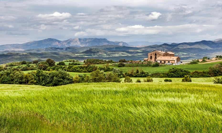 Casa Albets with green wheat fields in foreground in Andalucía, Spain