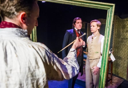 Aristocrat … John Gorick, centre, as Lord Henry Wotton with Rupert Mason and Guy Warren-Thomas in The Picture of Dorian Gray at Trafalgar Studios, London, in 2016.