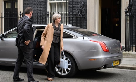Theresa May returning to Number 10 after delivering her Commons statement.