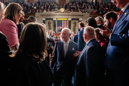 King Charles III is greeted by attendees after addressing Congress.