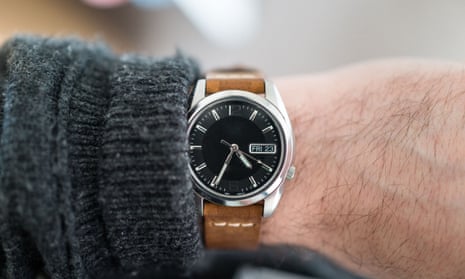 Wrist watch with black dial and leather strap