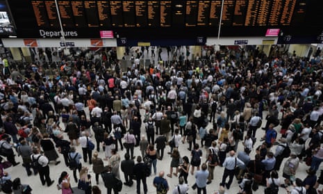 a throng of commuters at Waterloo