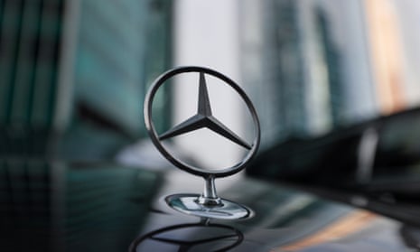 The emblem of Mercedes-Benz is seen on a car in downtown of Moscow, Russia, 26 October 2022.