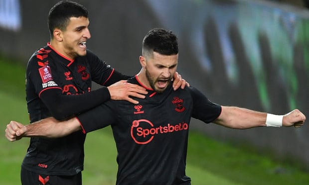 Southampton's Shane Long (right) celebrates with Mohamed Elyounoussi after scoring their side's third goal