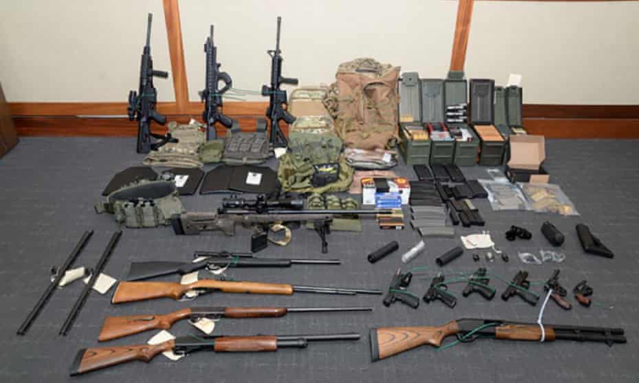 Law enforcement officers seized 15 guns and 1,000 rounds of ammunition from Christopher Hasson’s home in Silver Spring, Maryland.