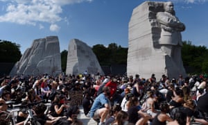 Demonstrators at the Martin Luther King Jr memorial in Washington.