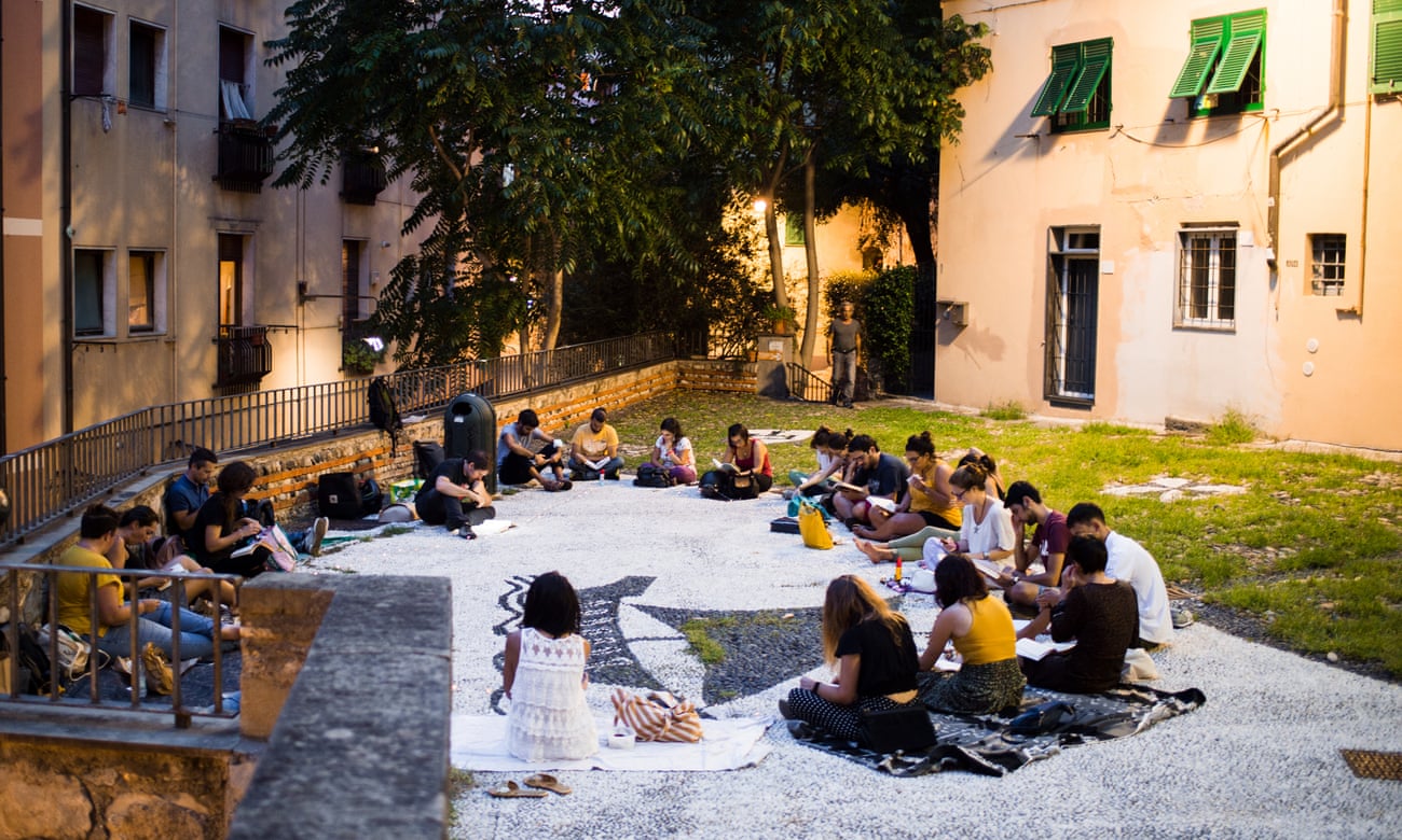Members of Silent Book Genova, a chapter of the global Silent Book Club, where members gather to read whatever book they want, and in silence.