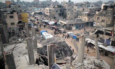 General view of market stalls amid the rubble of buildings destroyed during previous Israeli strikes, in Khan Younis in southern Gaza on 15 January.