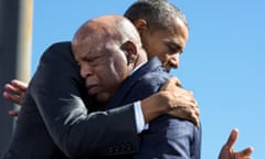Barack Obama hugs John Lewis.