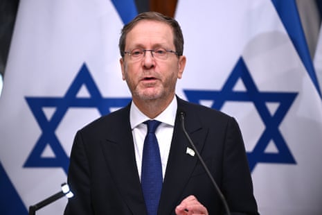 Isaac Herzog speaking at a press conference.