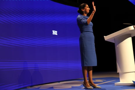Suella Braverman waving to the audience at the end of her speech to the Tory conference on Tuesday.