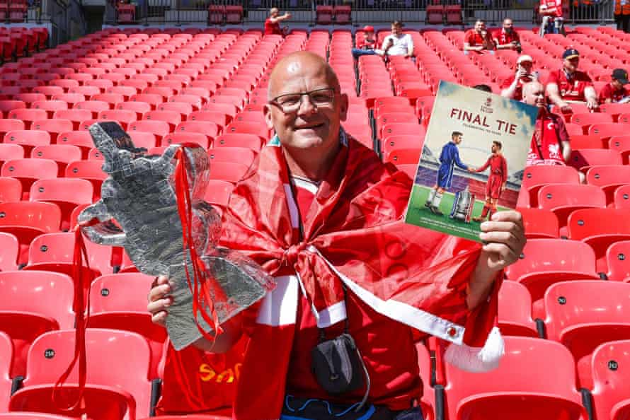 Chelsea v Liverpool: FA Cup final – live! | FA Cup 2 A Liverpool fan with a tin foil cup ahead of the FA Cup final.
