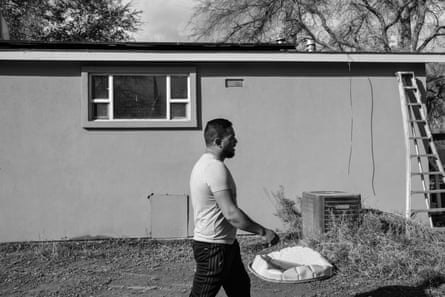 A man walks past a home
