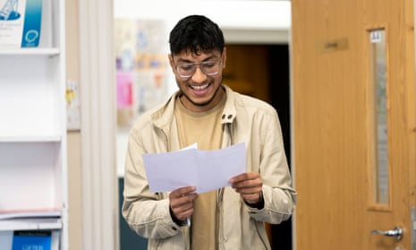 Habib Matlib smiles after he receives his A Level results at Ffynone House School in Swansea