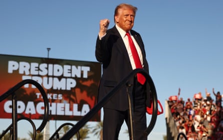 Republican presidential nominee Donald Trump walks onstage for a campaign rally in Coachella, California, on Saturday.