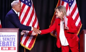 Democrat Mike Espy and Republican Cindy Hyde-Smith shake hands at a debate in Jackson, Mississippi on 20 November. 4712.jpg?width=300&quality=85&auto=forma