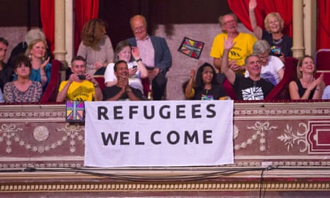 A sign reads ‘Refugees Welcome’ during the Last Night of the Proms at the Royal Albert Hall in west London.