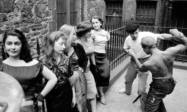 Street performer Montague Haltrecht (stripped to waist) rehearses his piece for the Edinburgh festival with Rod Robertson, September 1955.